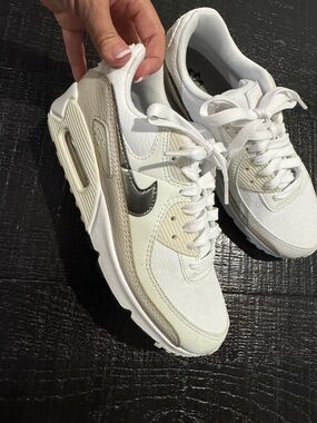 Nike Women’s White and Beige Sneakers with Metallic Swoosh